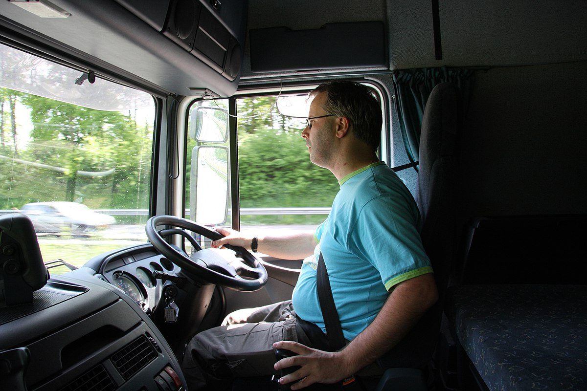 A truckdriver in his cabin