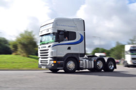 A white HGV truck with no trailer