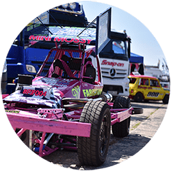 circular picture of a stock racing car at devon truck show