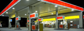 picture of a fuel forecourt at night